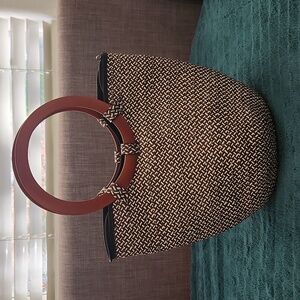 Woven straw bag with wood handles